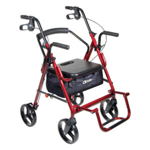 Introducing the Duet Rollator/Transport Chair with 8" casters: a red mobility walker equipped with four wheels, a padded seat, backrest, and hand brakes. It also offers a convenient storage compartment beneath the seat.