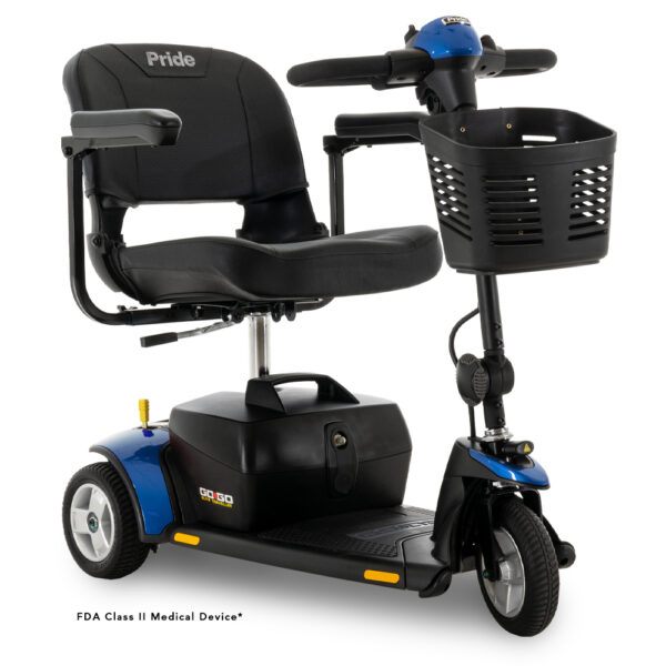 The Go Go® Elite Traveller 3 Wheel 18 Ah mobility scooter features a black seat, blue body, front storage basket, and is labeled as an FDA Class II medical device.