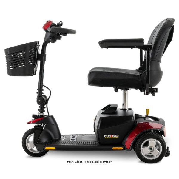 Side view of a Go Go® Elite Traveller 3 Wheel 18 Ah, featuring a black and red design with a seat, basket, and handlebars, made for personal mobility assistance.