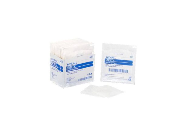 A box of McKesson sterilized 4 X 4 inch, 6-ply split sponges with one individual packet standing and another open, revealing the sponge inside.