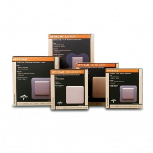 Five boxes of Optiform Adhesive Dressings in various sizes, displayed against a plain background.